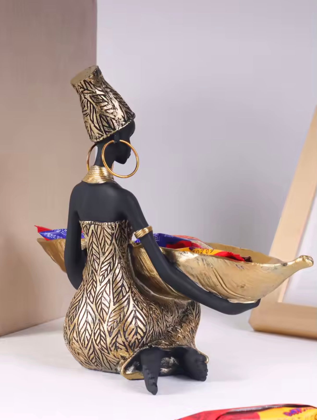 African girl plate sculpture