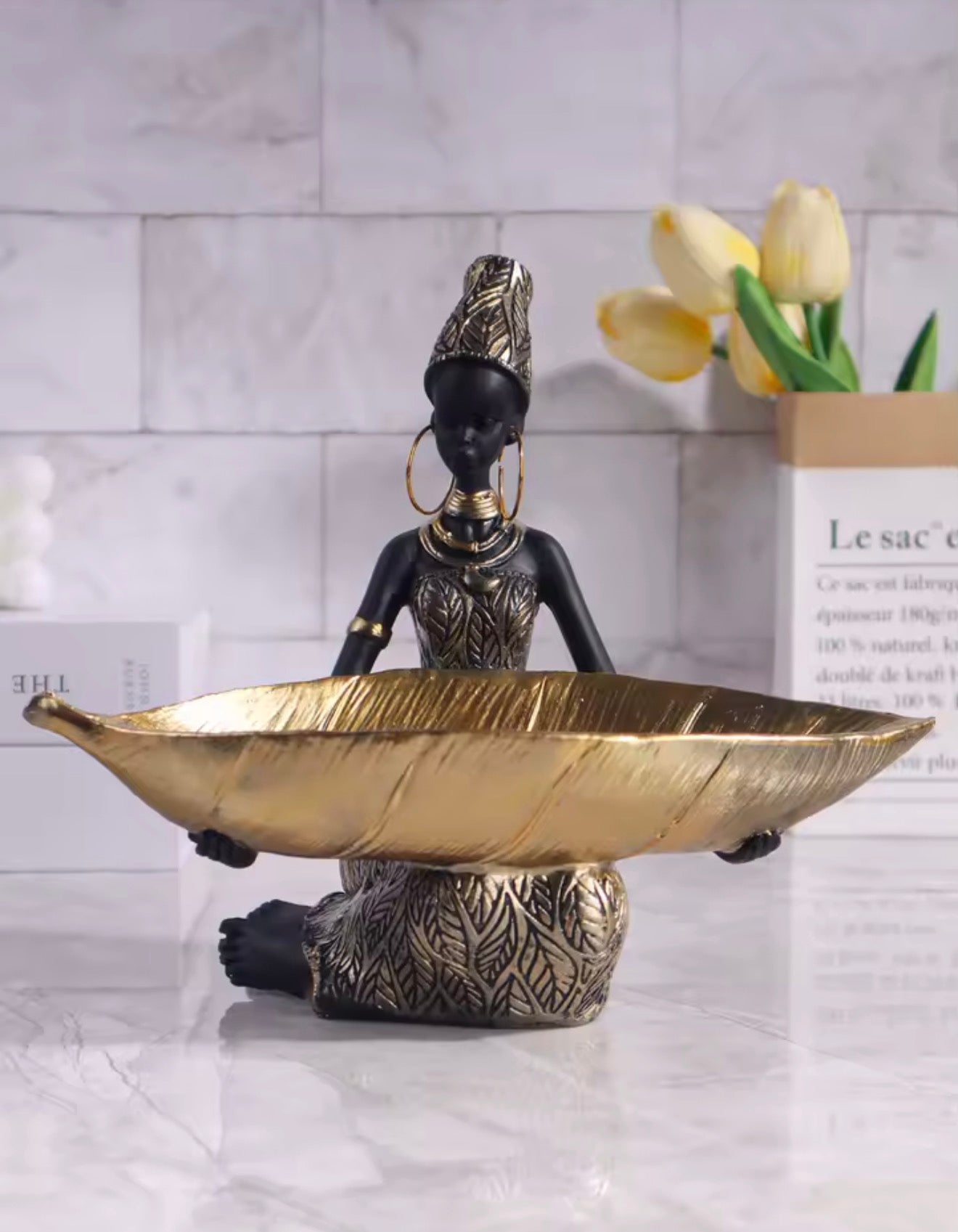 African girl plate sculpture